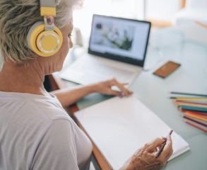 Senior woman embracing technology as she participates in a video call.